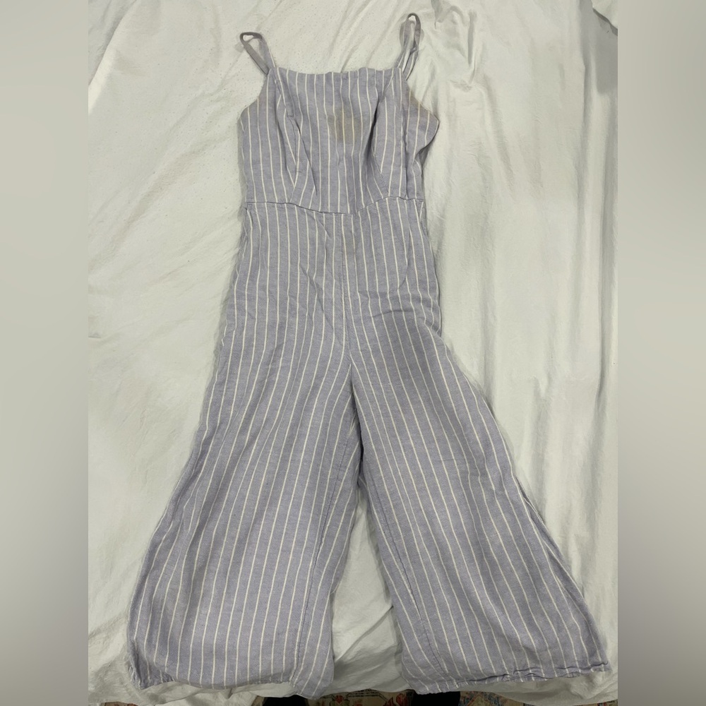 Blue and white striped jumpsuit. Minor stain on upper left side.#stripedjumpsuit